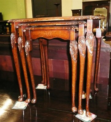 Lot 593 - A reproduction nest of tables