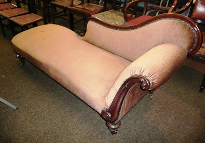 Lot 603 - A Victorian carved mahogany chaise longue