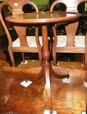 Lot 628 - Mahogany tripod table