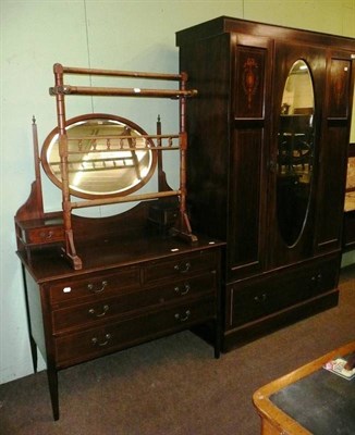 Lot 649 - An Edwardian inlaid mahogany three piece bedroom suite comprising wardrobe, washstand and...