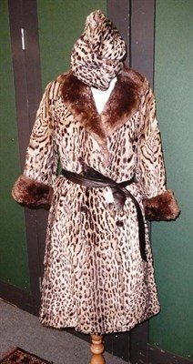 Lot 668 - Ocelot coat and similar hat