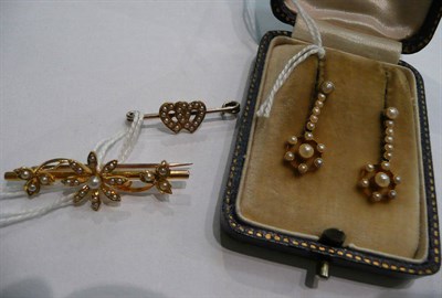Lot 8 - A pair of seed pearl drop earrings, a floral bar brooch and a heart motif brooch (3)
