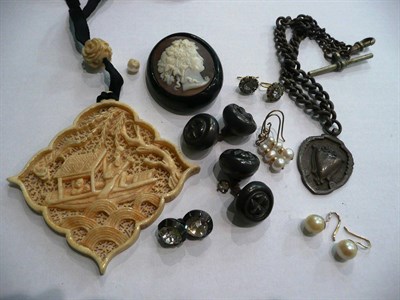 Lot 32 - A jet cameo brooch, a carved ivory pendant, cultured pearl earrings, etc