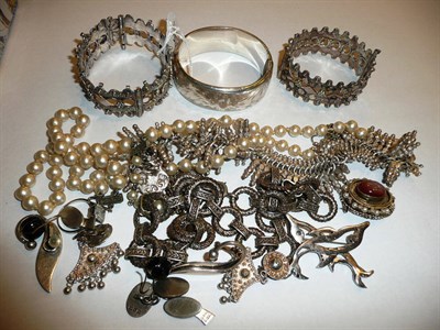 Lot 47 - A silver bangle, a pair of Swedish silver cuff links, a brooch marked "J.Pomey - 1957",...