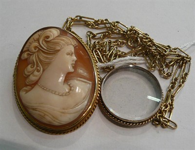 Lot 59 - A cameo brooch stamped '9CT', a figaro link necklet, with applied panel stamped '9C', and a locket