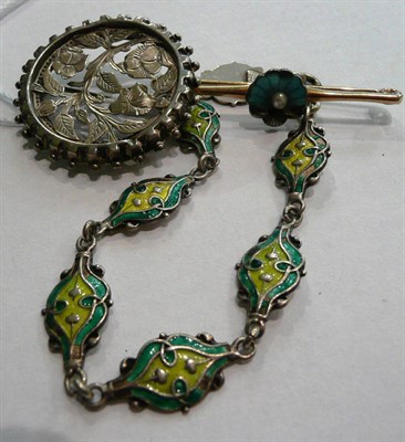 Lot 60 - A green enamelled bracelet (a.f.), a blue enamelled shell bar brooch (a.f.) and a pierced...