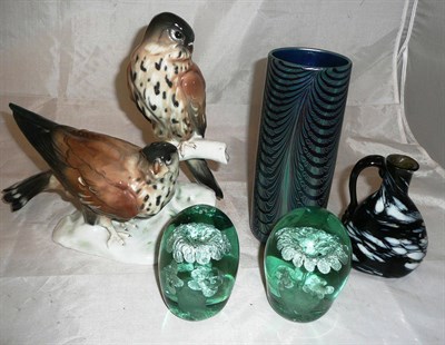 Lot 79 - An iridescent glass vase and two green dump paper weights a Nailsea flask, and a Volkstedt group of