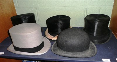 Lot 111 - Four top hats and a bowler hat