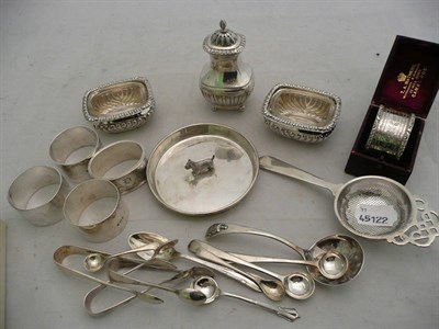 Lot 143 - A small quantity of silver including four napkin rings, one napkin ring cased, a three piece cruet