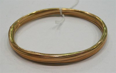 Lot 168 - A bangle stamped '9ct'