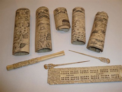 Lot 176 - An ivory cribbage board, carved ivory handles, cheroot holder etc