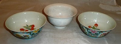 Lot 180 - Pair of Chinese blue ground bowls and a white bowl in individual boxes