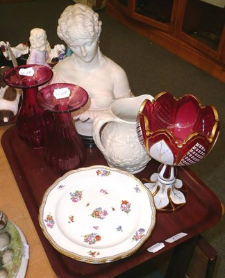 Lot 211 - A tray consisting of a pair of ribbed cranberry glass vases, a Parian jug, two Meissen plates,...