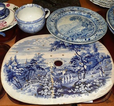 Lot 215 - A blue and white drainer depicting a scene of Edinburgh, a pearl ware plate and a miniature chamber