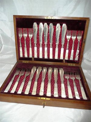 Lot 219 - Set of twelve plated and mother of pearl handled fish knives in a mahogany box