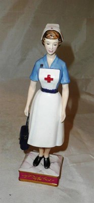 Lot 226 - A Royal Worcester model of a 'British Red Cross Society VAD Member', limited edition number 136/750