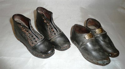 Lot 232 - Two pairs of children's leather clogs