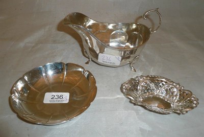 Lot 236 - A silver dish, Birmingham, 1961, a sauceboat, Birmingham 1949 and a pierced silver dish