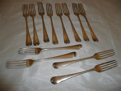 Lot 262 - A set of twelve George III silver Old English pattern table forks, London 1783