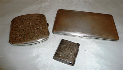 Lot 267 - Two silver cigarette cases and a vesta case