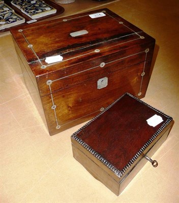 Lot 314 - Rosewood hinged box with fitted interior and a small oak hinged box enclosing an alphabet game (2)