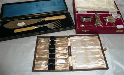 Lot 365 - A silver condiment set, silver dessert forks and a fish slice and fork