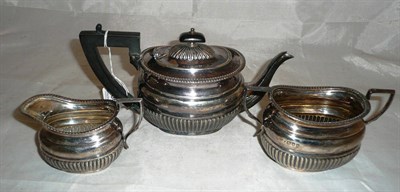 Lot 386 - A silver three piece tea service