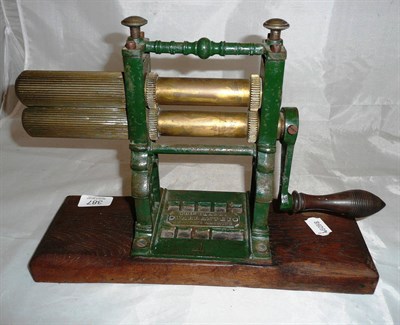 Lot 387 - Brass mounted 'Thos Clark's crimping machine'