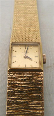 Lot 394 - Omega wristwatch stamped 9ct