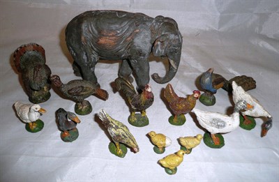 Lot 396 - An elastolin elephant and thirteen farmyard figures