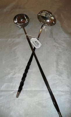 Lot 405 - Two punch ladles with whalebone handles inset with George II and George IV silver coins...