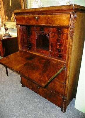 Lot 457 - A Georgian walnut secretaire with fitted interior