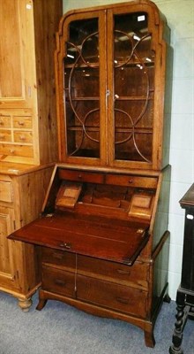 Lot 471 - 1930s oak bureau bookcase