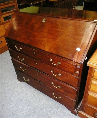 Lot 487 - A Georgian mahogany bureau