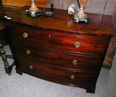 Lot 489 - Georgian bow front mahogany chest of drawers