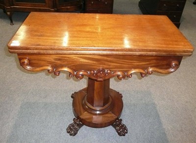 Lot 506 - A William IV carved mahogany fold over tea table