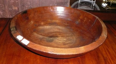 Lot 511 - A large sycamore dairy bowl