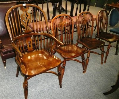 Lot 519 - Four Windsor chairs including one carver