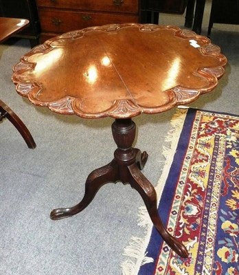 Lot 532 - Carved mahogany tripod table