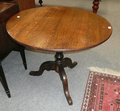 Lot 541 - Georgian oak tripod table