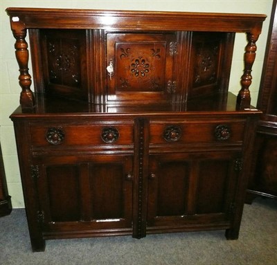 Lot 566 - A reproduction oak court cupboard