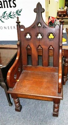 Lot 577 - A carved oak Gothic chair