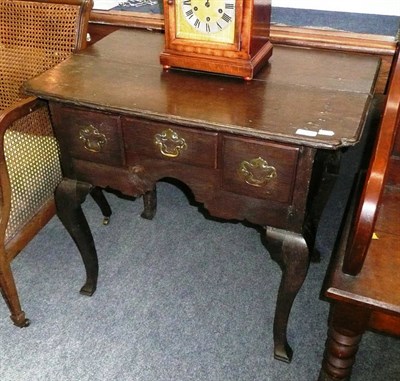 Lot 579 - Georgian oak low boy with cabriole legs