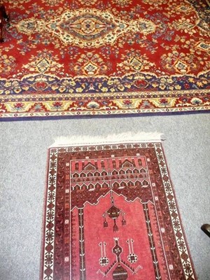 Lot 581 - Afghan Prayer rug Afghan Turkestan; the field with hanging lamp beneath the Mihrab, 113 x 73 cm...