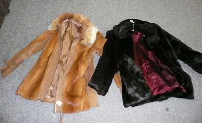 Lot 612 - A brown suede and fur-trimmed zip-front jacket and brown rabbit fur jacket