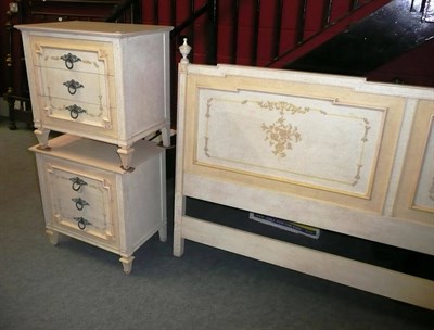 Lot 618 - Cream painted bedside cabinets and a headboard by John Widdicomb