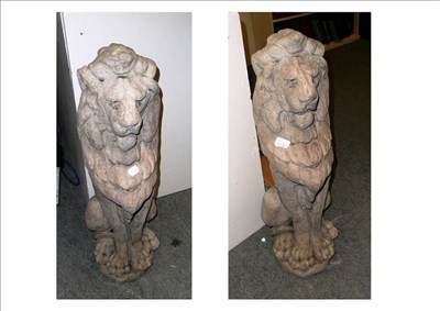 Lot 694 - Pair of composition garden lions