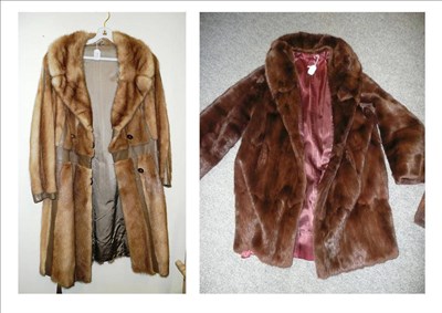 Lot 701 - Fur and leather panelled coat with tie belt and another fur (2)