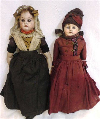 Lot 1001 - Bisque Shoulder Head Doll with fixed brown eyes, open mouth, original wig and possibly costume,...