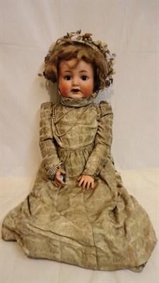 Lot 1004 - Simon and Halbig Bisque Socket Head Doll, impressed '156/12 1/2' with original blond wig,...